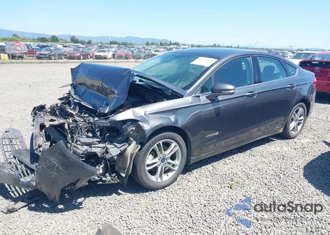 2016 Ford Fusion Hybrid Se z USA, uszkodzony, nr VIN 3FA6P0LU3GR386983